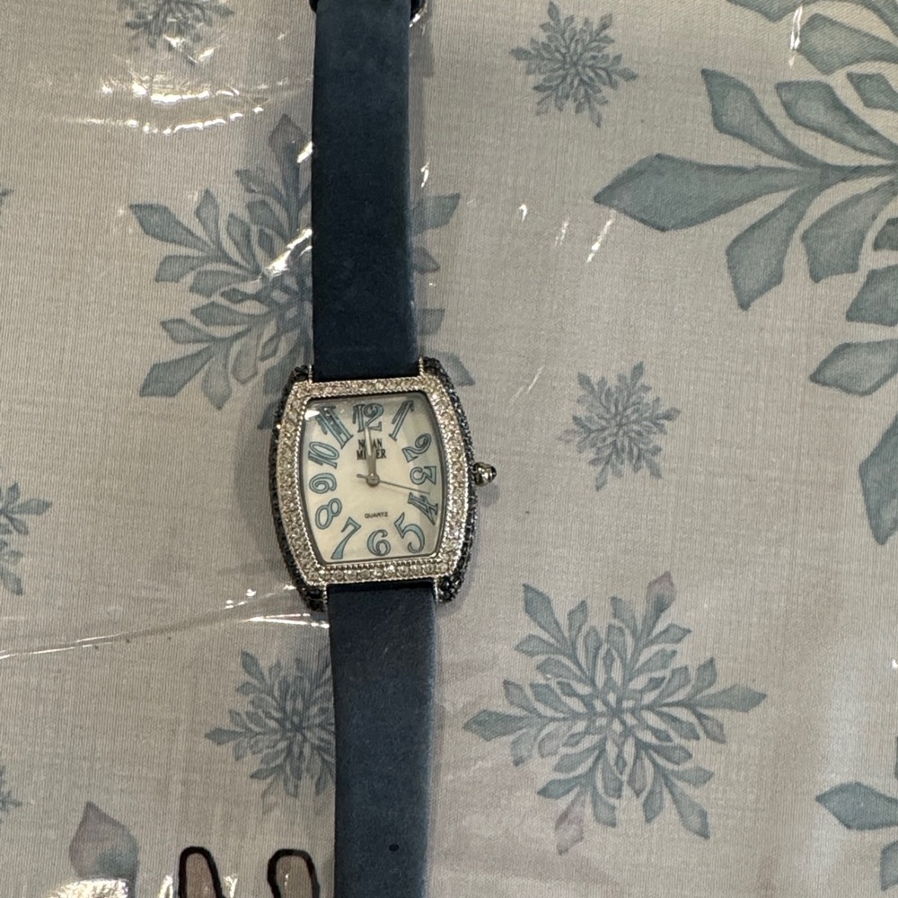 Nolan Miller Blue and Silver Women's Watch